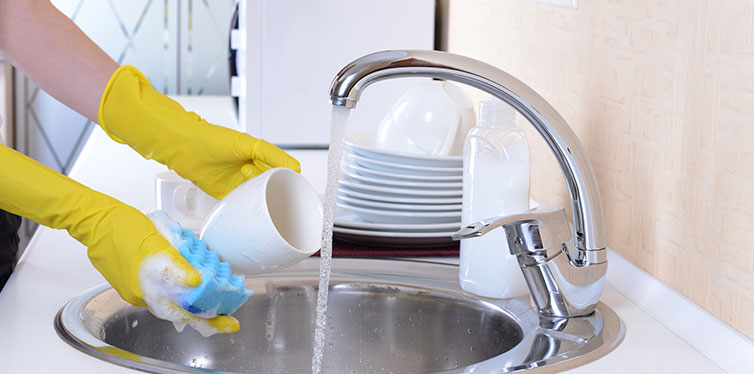 washing cups in a sink